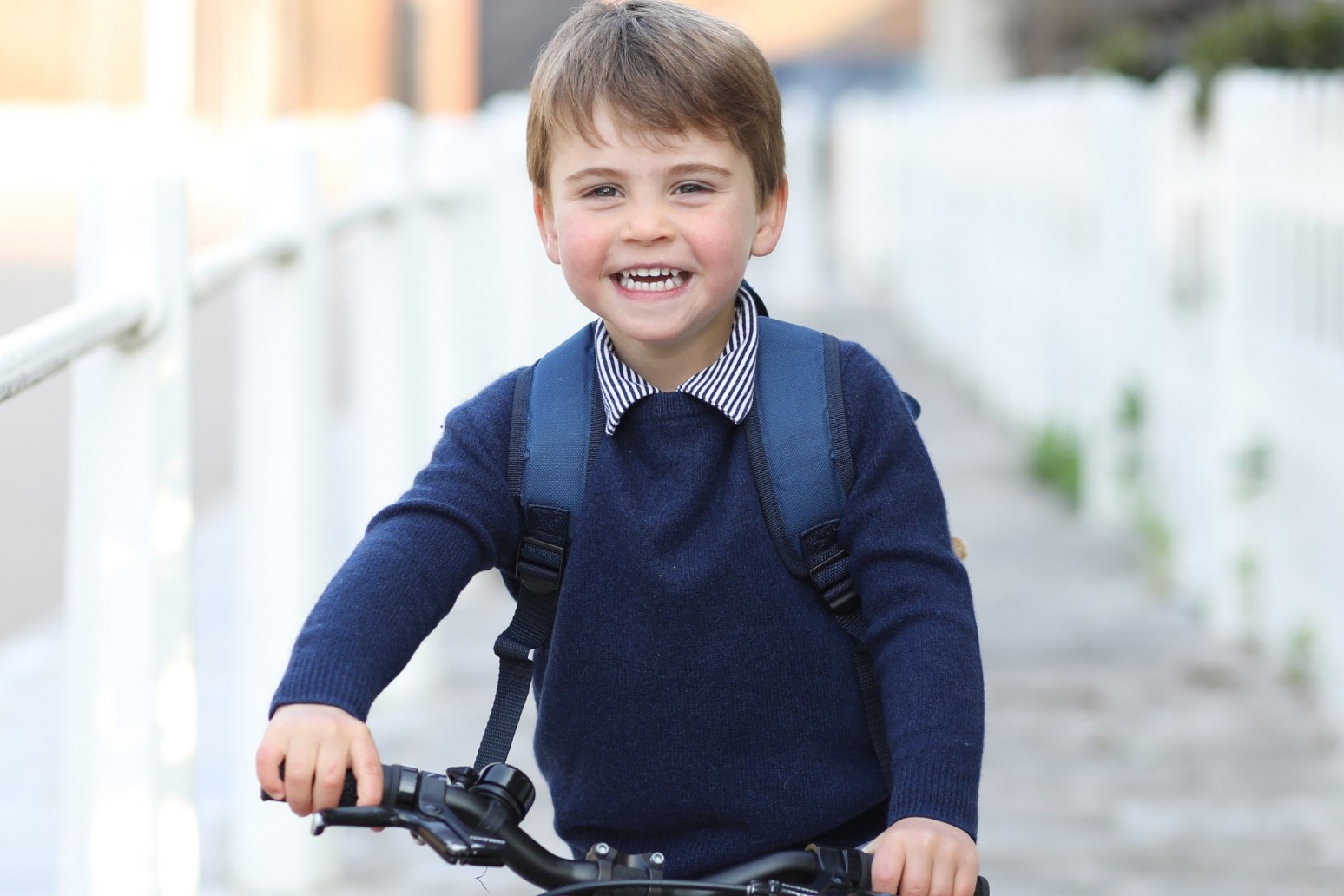 Prince Louis’s third birthday marked with picture of young royal on his bike 